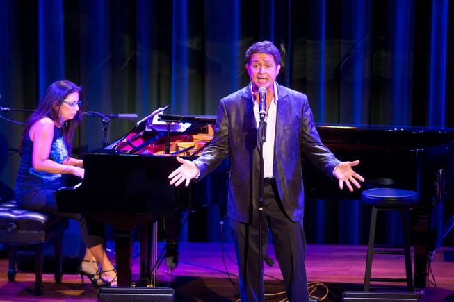 Keith Thompson, musical director for "Jersey Boys," sings an opening number as he hosts The Composers Showcase at Cabaret Jazz in The Smith Center for the Performing Arts on Wednesday, Aug. 8, 2012.